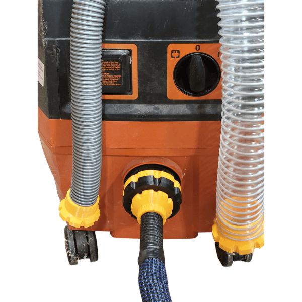 Dust extractor size-down adapter for 2-1/2" and 1-1/4" vacuum hoses.